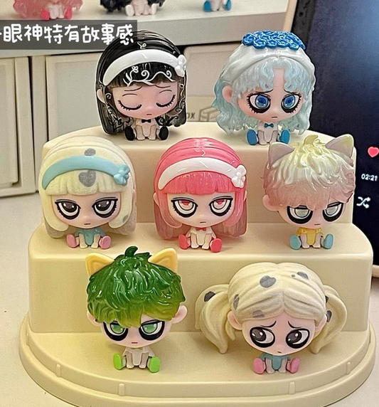 Kiki Sitting In A Row Bean toy doll