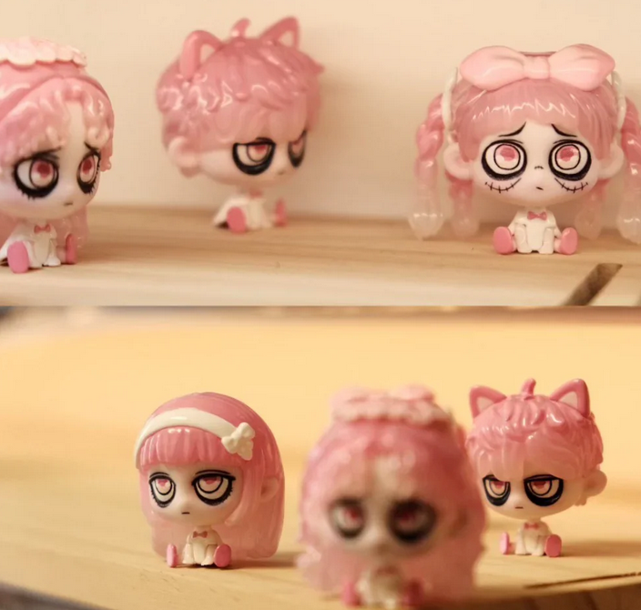 Kiki Sitting In A Row Bean toy doll