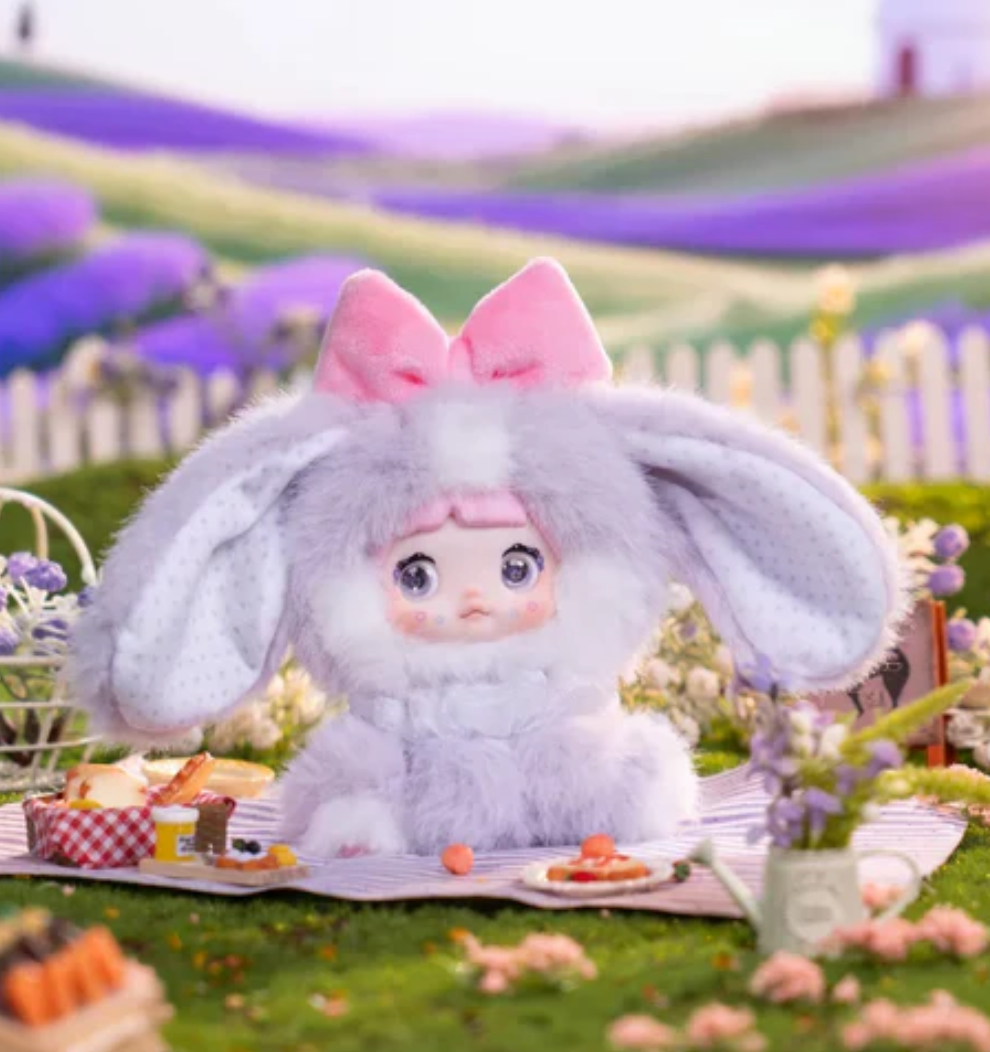 Nommi Sitting Zoo Plush toy doll