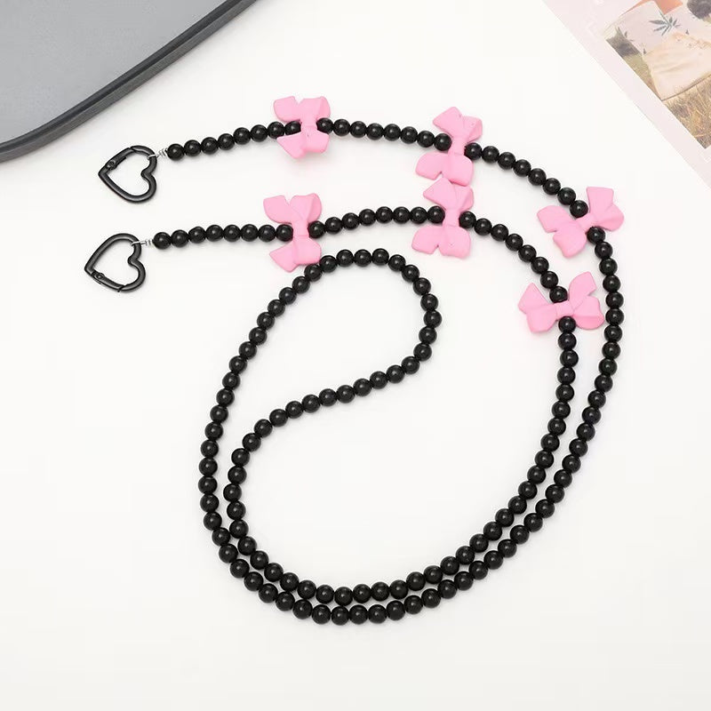 Crossbody chain toy doll